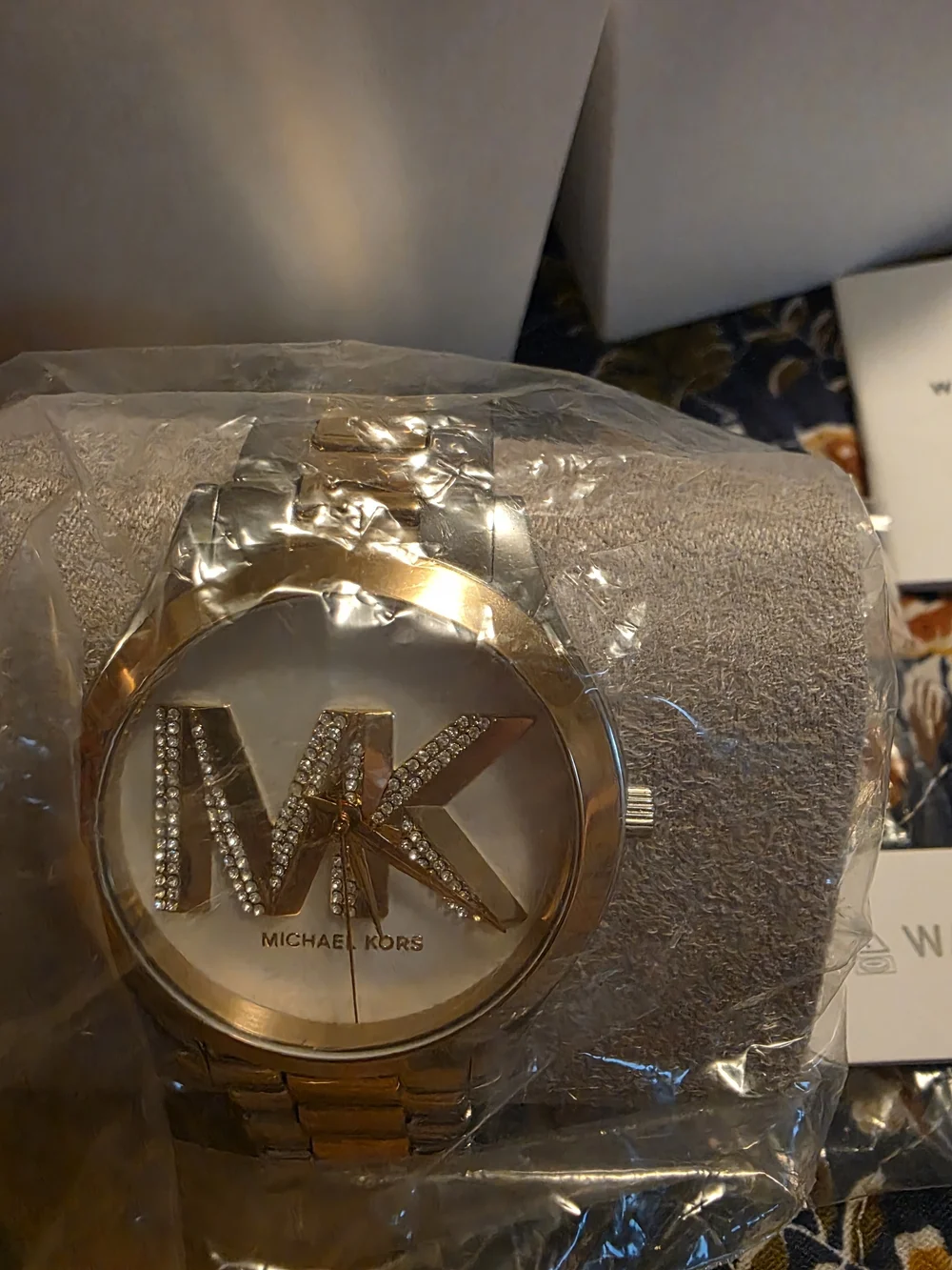 Womens Michael Kors Two Tone Gold And Silver Crystal MK Logo Watch Face.